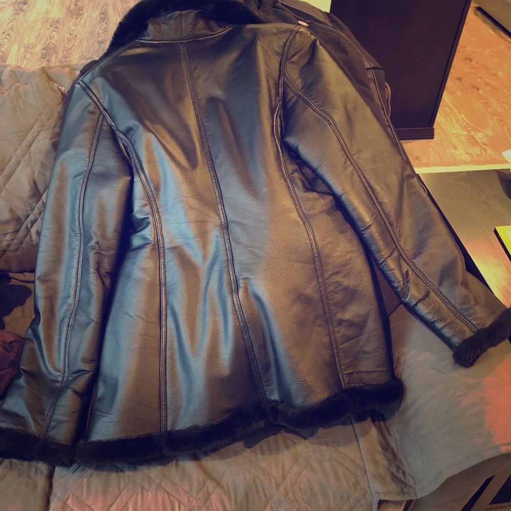 Women’s Wilson, faux fur lined leather coat.